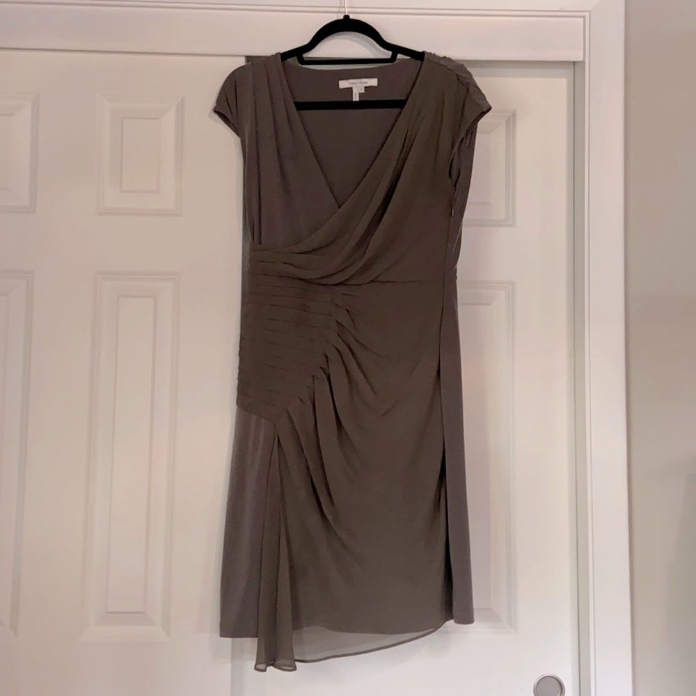 Cocktail dress with side pleating